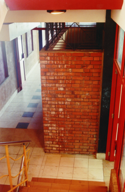 Brickwork and red detailing inside the original bakery complex