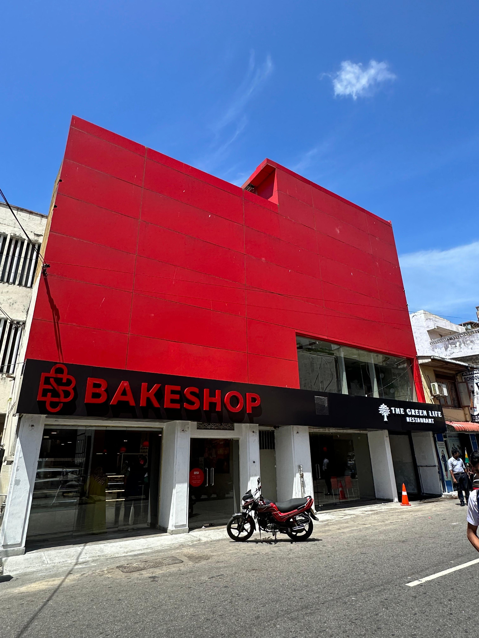 BakeShop outlet beneath a bold red facade